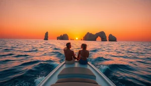 Experience Cabo sunset cruise deals on a romantic evening with a boat against a colorful skyline.